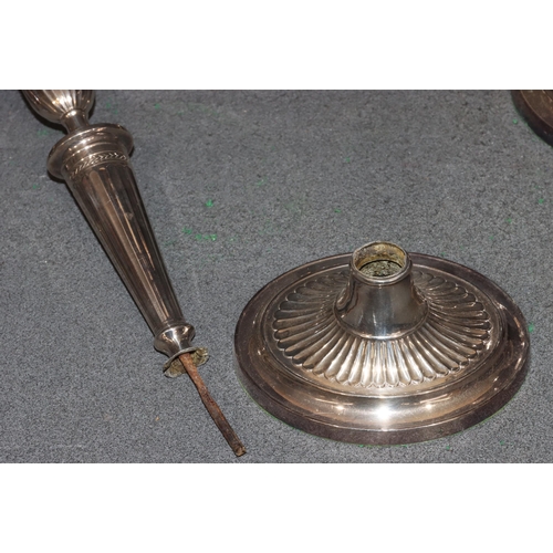 467 - A pair of silver plated candelabras with scroll shaped arms, turned stems on oval sweeping bases (1 ... 