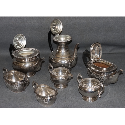 468 - A 4-piece silver plated round bulbous shaped tea and coffee service with black scroll handles and fi... 