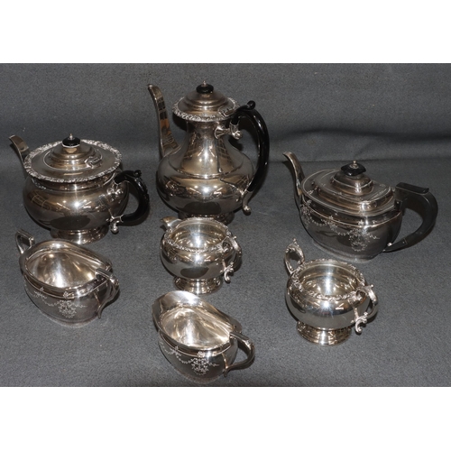 468 - A 4-piece silver plated round bulbous shaped tea and coffee service with black scroll handles and fi... 