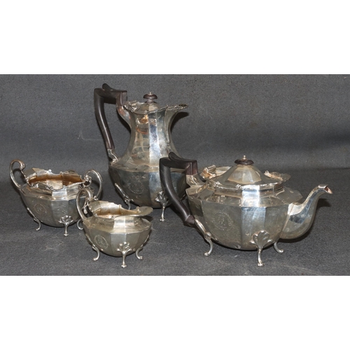 471 - A George V silver octagonal tea service with chamfer decoration, comprising of teapot, hot water jug... 