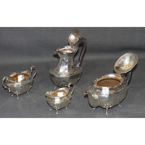 471 - A George V silver octagonal tea service with chamfer decoration, comprising of teapot, hot water jug... 