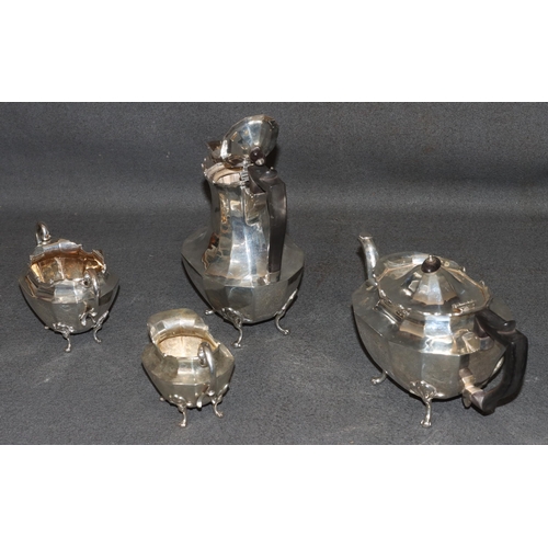 471 - A George V silver octagonal tea service with chamfer decoration, comprising of teapot, hot water jug... 