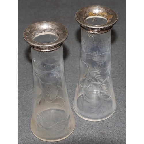 481 - A pair of cut glass vases with London silver tops and allover etched floral and leaf decoration, 21c... 