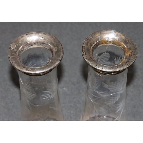 481 - A pair of cut glass vases with London silver tops and allover etched floral and leaf decoration, 21c... 