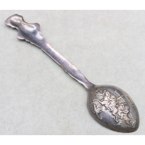 485 - A late Victorian silver spoon with raised figurehead finial and allover raised and embossed horse ra... 