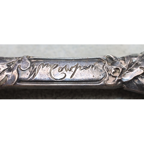 485 - A late Victorian silver spoon with raised figurehead finial and allover raised and embossed horse ra... 