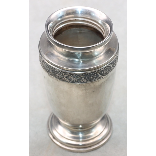 487 - A Birmingham silver small round bulbous thin necked vase with embossed floral and leaf decoration, o... 