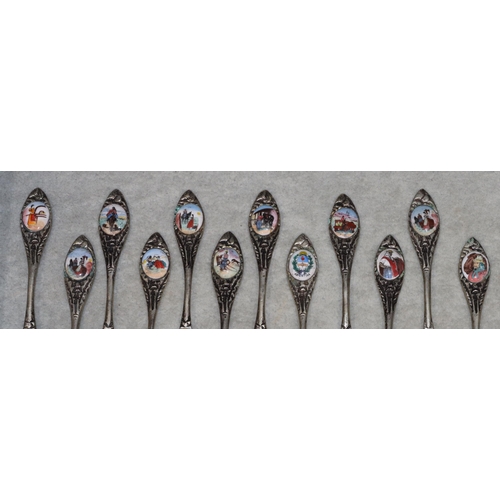 492 - A set of 6 800 silver coloured metal teaspoons, 1.7oz and 12 Continental spoons with china finials