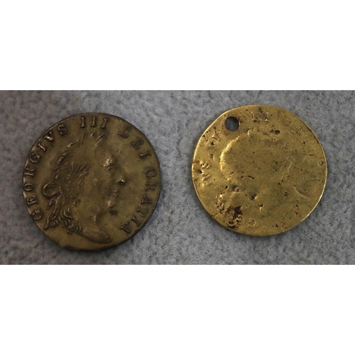 709 - A George III gold Third Guinea (worn and hole drilled), 3.8 grams and an 18th Century George III Tok... 