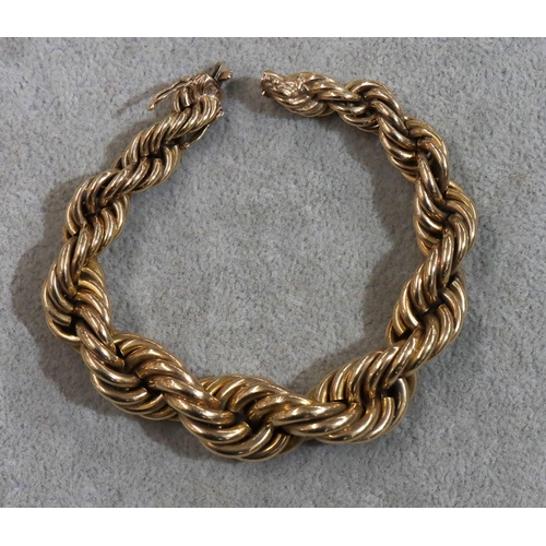 749 - A heavy gold graduated twist bracelet, 19cm long, 86.2 grams