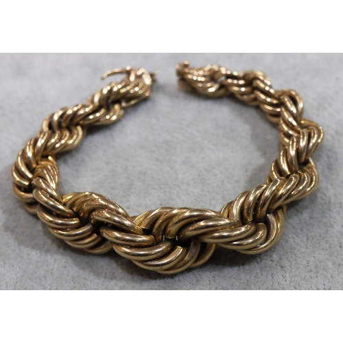 749 - A heavy gold graduated twist bracelet, 19cm long, 86.2 grams