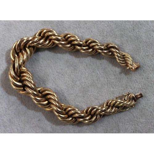 749 - A heavy gold graduated twist bracelet, 19cm long, 86.2 grams