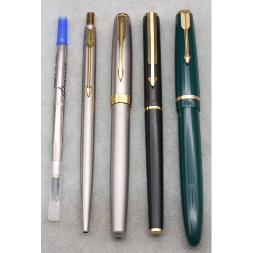 750 - A green Parker duofold fountain pen (boxed), a Parker pen, a similar Parker pen and another Parker p... 