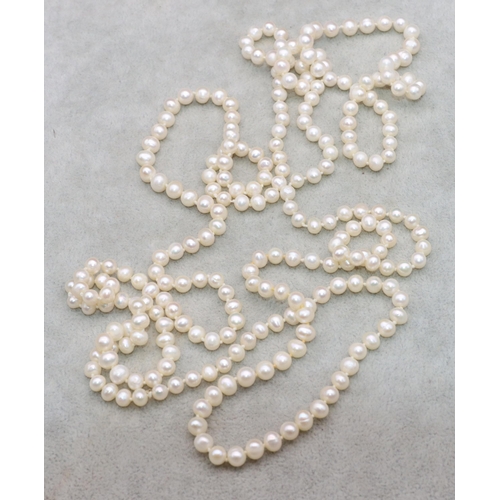 751 - A cultured pearl long necklace, approx. 147cm long