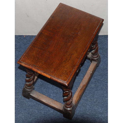 985 - An oak rectangular shaped joint stool with thumb pattern frieze with open barley twist legs and stre... 