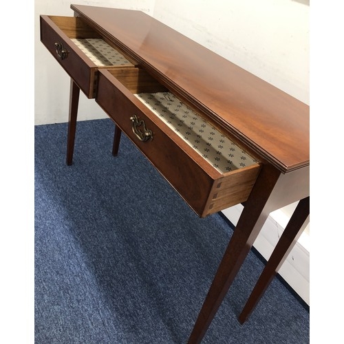 1405 - A good quality reproduction mahogany hall table with 2 drawers, 106.5cm wide, 31.5cm wide, 77cm high... 