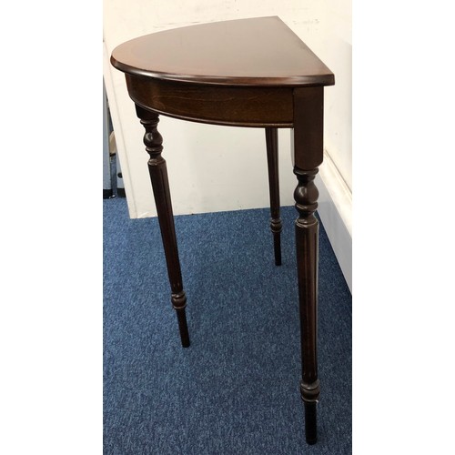 1404 - A reproduction mahogany demi-lune side table, 76cm wide, 36.5cm deep, 76cm high.