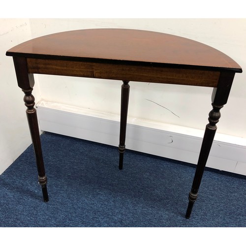 1404 - A reproduction mahogany demi-lune side table, 76cm wide, 36.5cm deep, 76cm high.