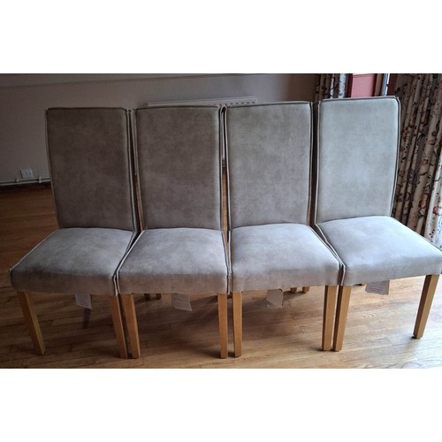 1406 - A set of 4 dining chairs with light grey suede effect fabric seats and backs.