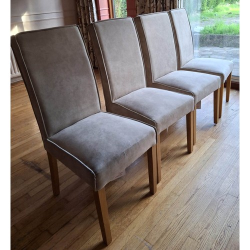 1406 - A set of 4 dining chairs with light grey suede effect fabric seats and backs.