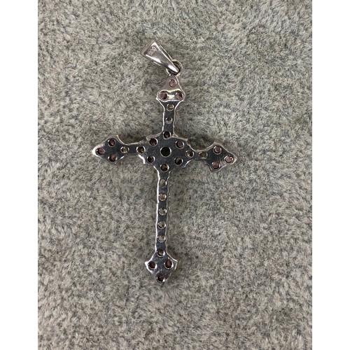 1290 - A 9ct white gold cross pendant set with white and pink stones, 4.5cm long