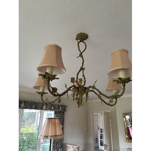 1385 - An ornate brass 4-light pendant light, 2 other pendant lights and 2 wall lights.  This item is not h... 