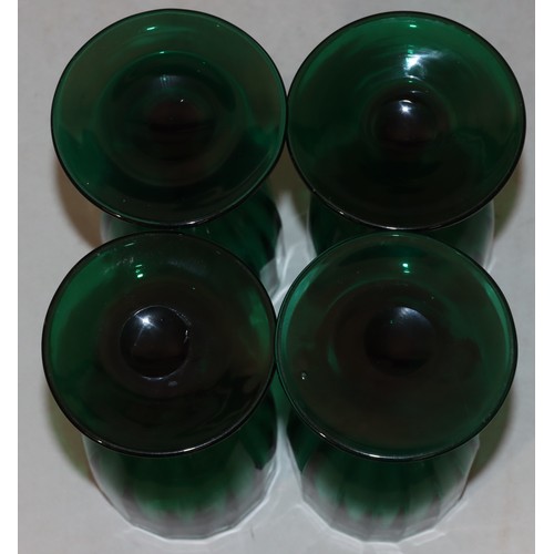 178 - A set of 4 Georgian Bristol green glass bulbous shaped drinking glasses on round bases with fluted d... 