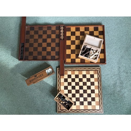 1390 - 3 chess and draught boards (1 with storage compartments either side) and a set of dominos.  This ite... 