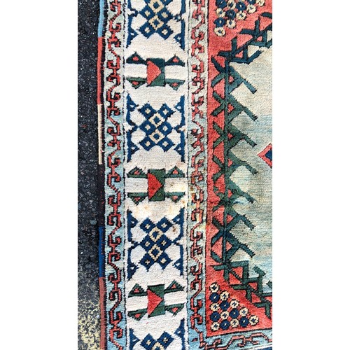 1415 - A Turkish wool rug, 237cm long, 138cm wide (some spot marks).