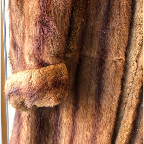 1417 - A 1940's vintage long fur coat, approx. size 12, 108cm long, sleeves, 61cm long to shoulder (tear to... 