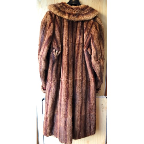 1417 - A 1940's vintage long fur coat, approx. size 12, 108cm long, sleeves, 61cm long to shoulder (tear to... 