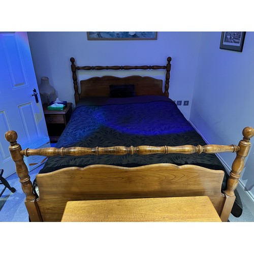 1430 - A modern pine double bed, 153cm wide, 208cm long, headboard 122cm high, footboard 101cm high, mattre... 