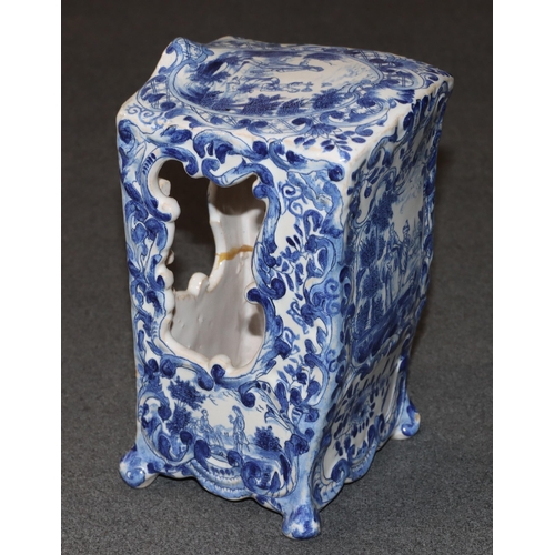 83 - A Continental Delft blue and white ornament in the form of a Sedan chair with allover floral, leaf a... 