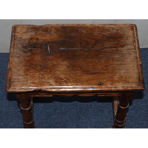 987 - An 18th/19th Century oak rectangular shaped joint stool with shaped frieze, turned legs and stretche... 