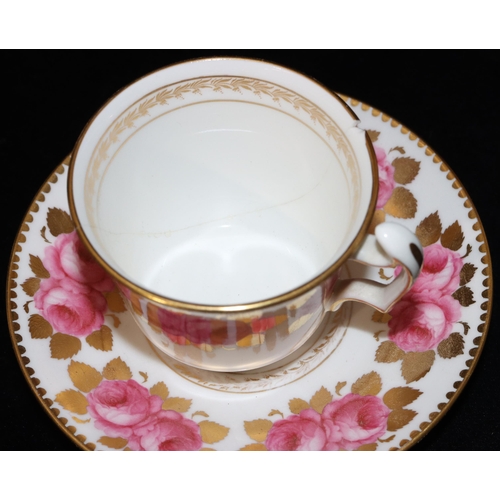 28 - 2 Royal Worcester cups and saucers on white and blue ground with coloured floral and red decoration ... 