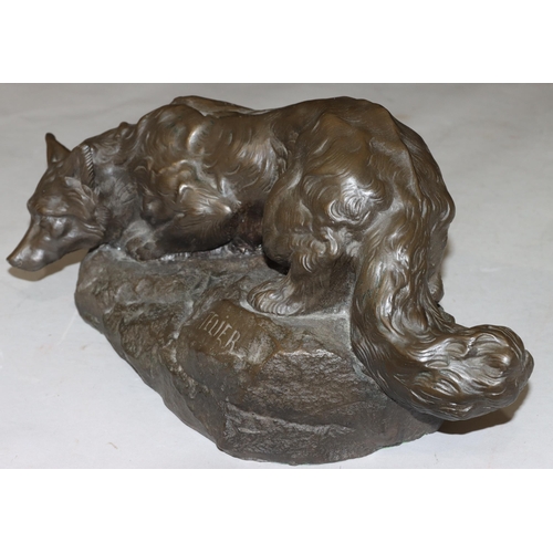 824 - A composition resin model of a fox after Bartelier, 39cm long, 18.5cm high