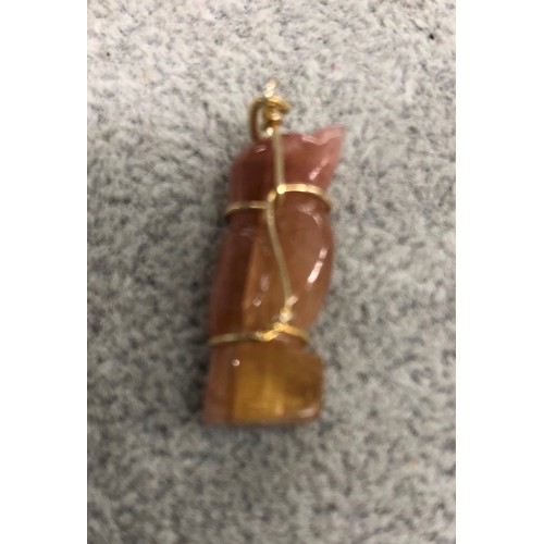 1282 - A bird shaped tourmaline stone pendant, 2.5cm long.