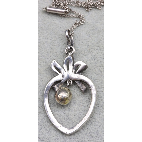 567 - A Georgian silver paste heart shaped pendant with chain