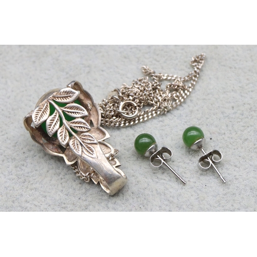 582 - A silver coloured metal Chrysoprase pendant with chain and a pair of silver earrings (3)