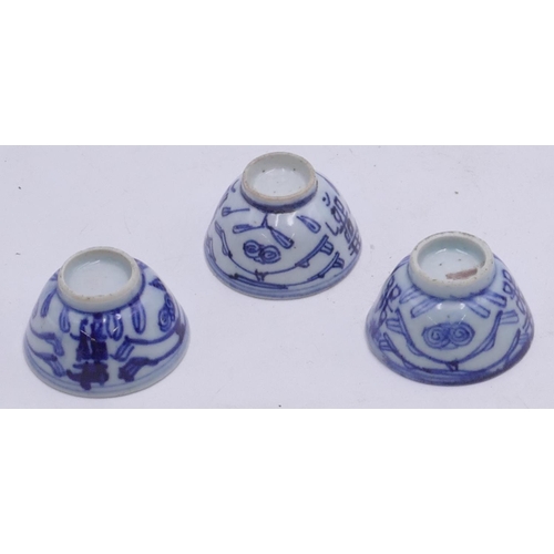 142 - 3 Oriental blue and white round tea bowls.