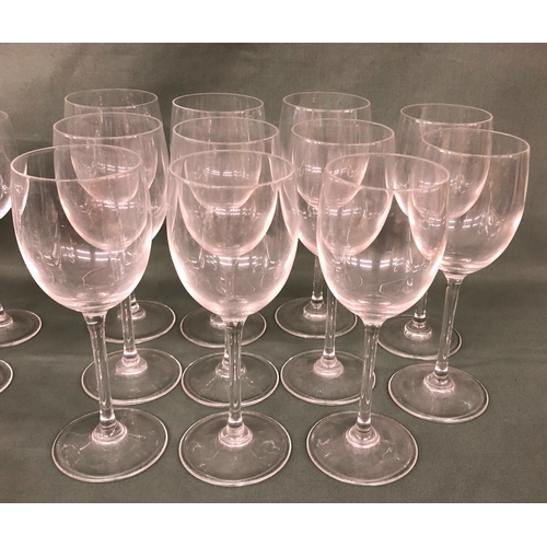 2001 - 7 heavy based champagne flutes with twisted stems, 18.5cm high, 11 wine glasses, 19.7cm high, 9 smal... 