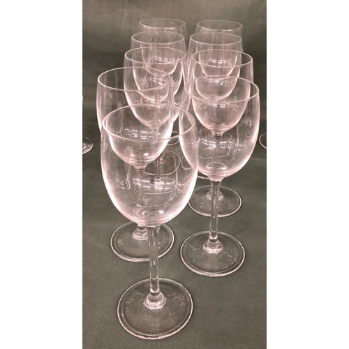 2001 - 7 heavy based champagne flutes with twisted stems, 18.5cm high, 11 wine glasses, 19.7cm high, 9 smal... 