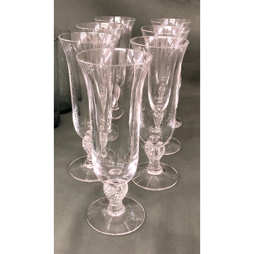 2001 - 7 heavy based champagne flutes with twisted stems, 18.5cm high, 11 wine glasses, 19.7cm high, 9 smal... 