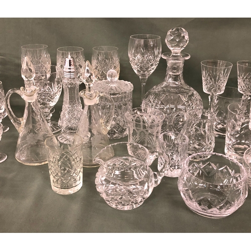 2002 - A quantity of various cut glass including a decanter, bowls, a jug and various glasses of different ... 