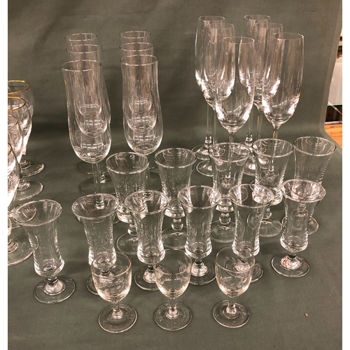 2003 - A quantity of various glasses including 2 sets of 6 champagne flutes, brandy glasses, 4 Irish coffee... 