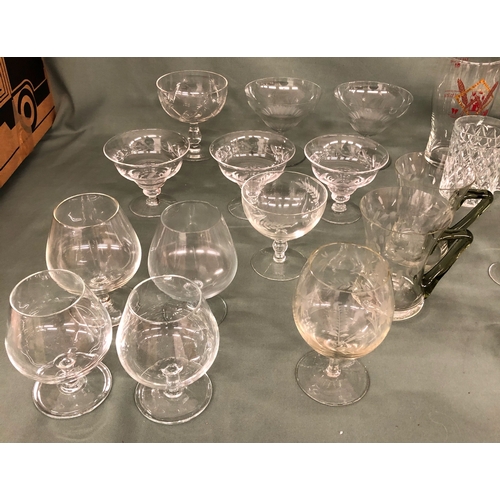 2003 - A quantity of various glasses including 2 sets of 6 champagne flutes, brandy glasses, 4 Irish coffee... 