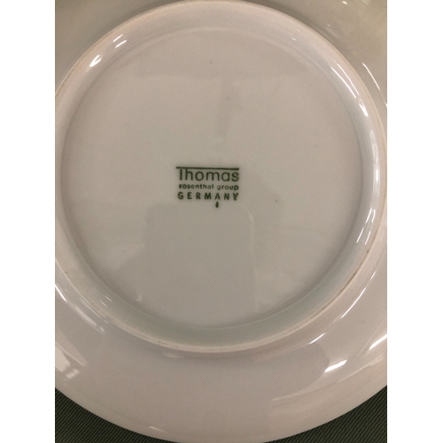 2005 - A Thomas Rosenthal Group part dinner service with silver rim, 4 large dinner plates, 6 medium dinner... 