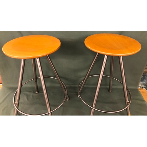 2007 - A pair of Bulthaup stools with wood circular seats on chrome legs, 65cm high. This Lot is held in st... 