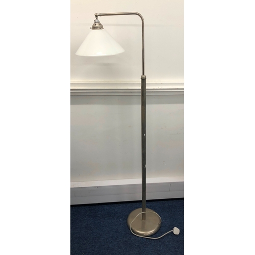 2010 - A metallic floor lamp with white glass shade, extending height (slight dents to base and part missin... 