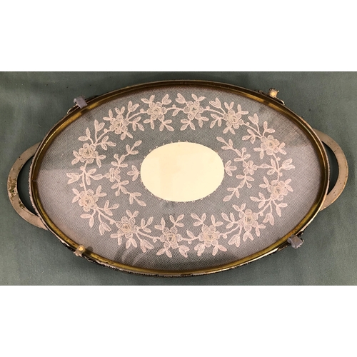 2024 - An embroidered oval dressing table tray, 35.5cm wide 20.7cm deep, a Nao group of 2 young boys throwi... 